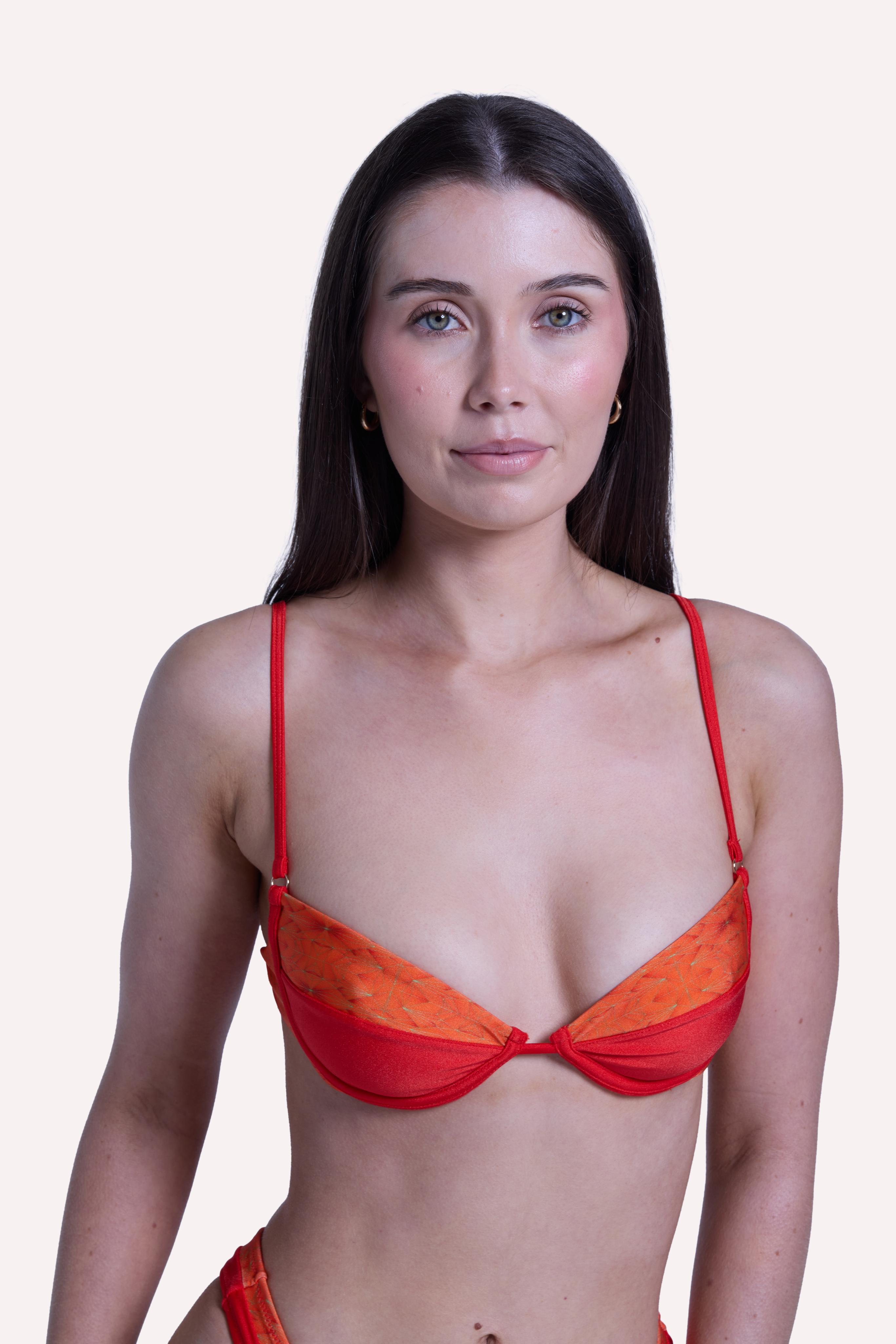 Close up of Avara jewel print fabric on Vida bikini top in sunset tones